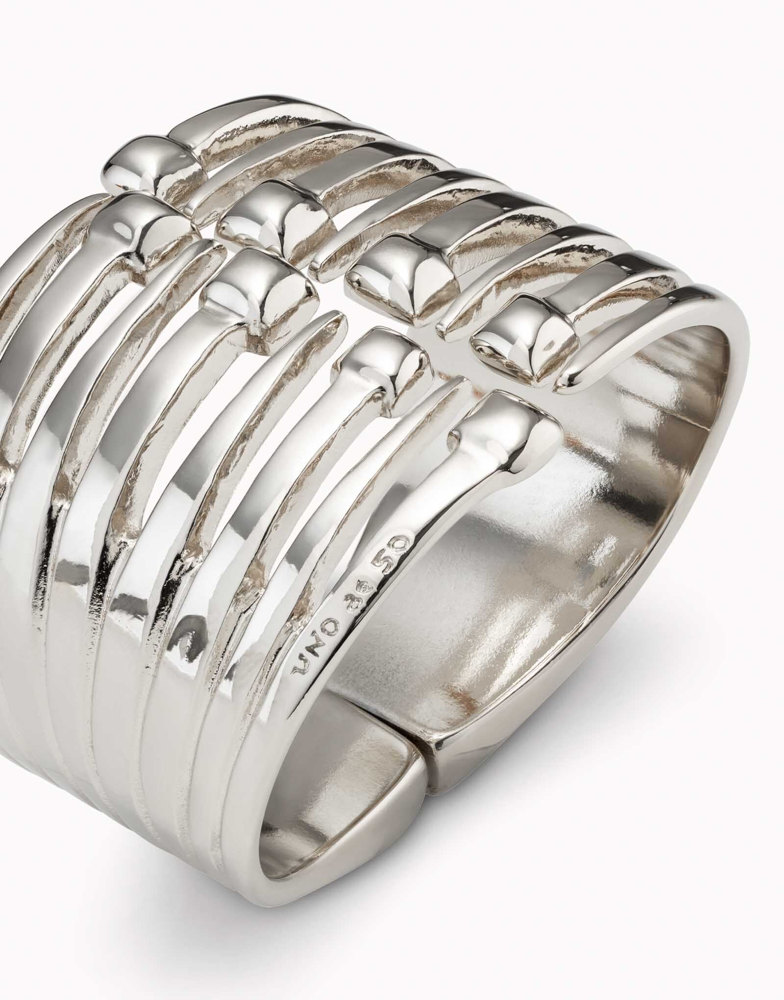 Bangle bracelet with multiple nail heads