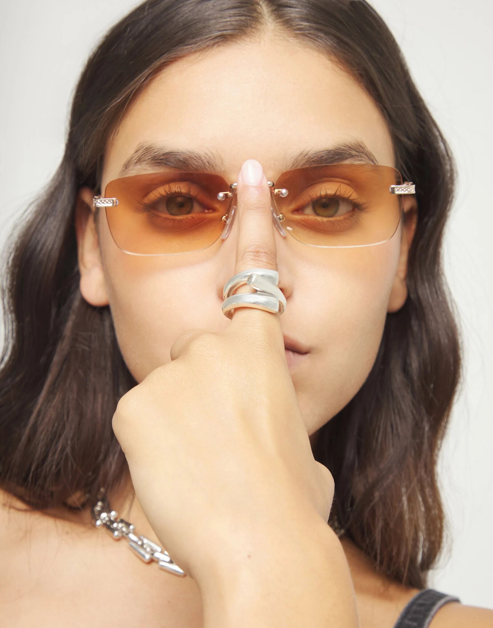 Ring with three intertwined organic shapes