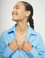 Collar ba&ntilde;ado en oro 18k con detalle de coraz&oacute;n peque&ntilde;o