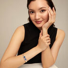 Bangle bracelet with two blue crystals