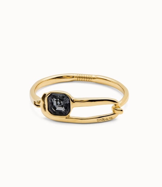 Pulsera rígida bañada en oro 18k  con cristal facetado negro