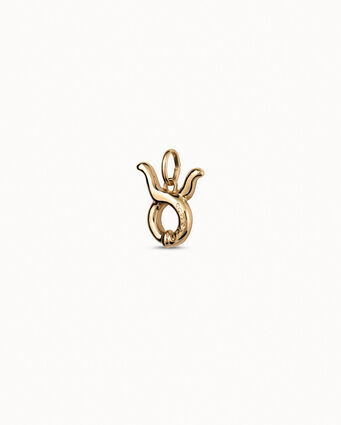 Charm bañado en oro de 18k con forma de signo tauro