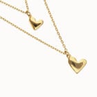 Multi strand chain necklace with two hearts