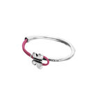 Pink leather bracelet with butterfly ornament