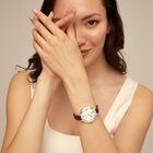 Sterling silver-plated watch with black leather strap and round white dial