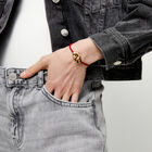 Red leather bracelet with interlocking carabiner