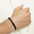Leather braided bracelet with golden clasp