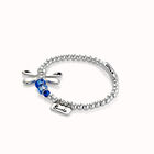 Beaded stretch bracelet with a dragonfly and blue crystal