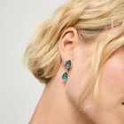 Long  earrings with two green drop-shaped faceted crystals