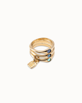 Anillo triple bañado en oro de 18k con cristales azules.