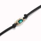 Leather bracelet with a green crystal