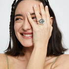 Eye-shaped signet ring with faceted green crystal