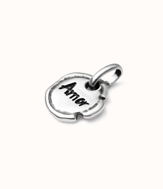 Sterling silver-plated charm with the word “love”.