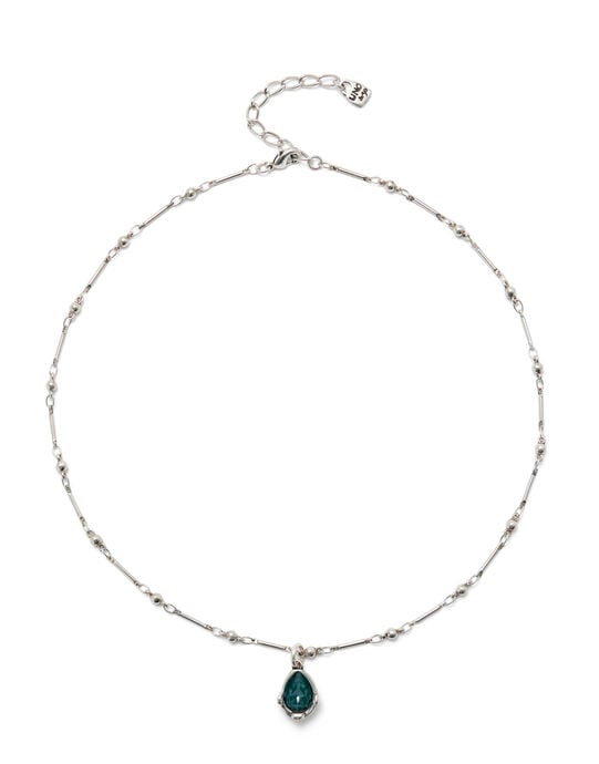 Necklace with a green drop-shaped faceted crystal