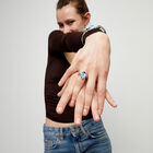 Ring with blue oval faceted crystal