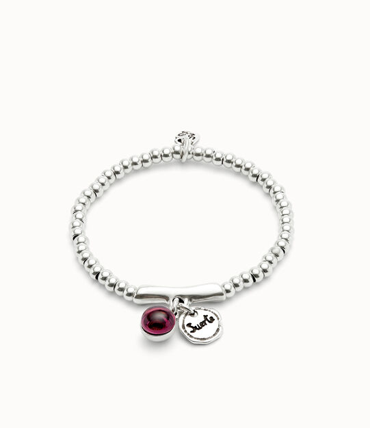 Beaded stretch bracelet with a murano glass and the word lucky