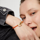 Orange leather bracelet with interlocking carabiner