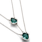 Double necklace with two drop-shaped pendants featuring blue faceted crystals