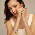 Leather bracelet with a crystal and a pearl