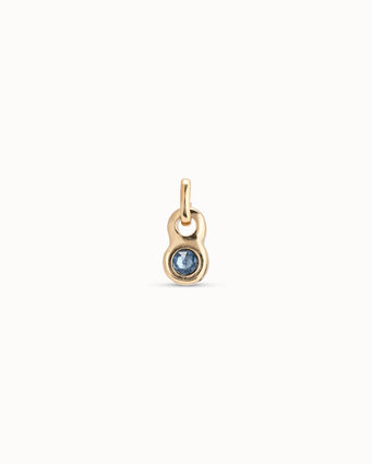 Charm bañado en oro de 18k con forma redonda y un cristal azul