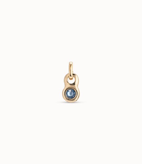 Charm bañado en oro de 18k con forma redonda y un cristal azul