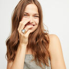 Large triangular ring with crystals