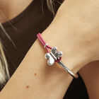 Pink leather bracelet with butterfly ornament