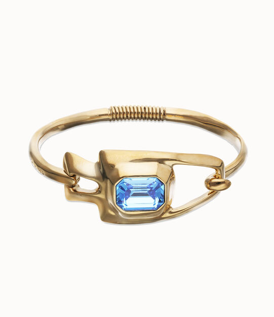 Semi-rigid bracelet with blue faceted crystal