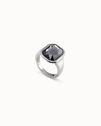 Silver-plated ring with central hexagonal case and dark gray crystal