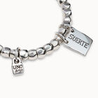 Beaded stretch bracelet with tubular piece and a charm