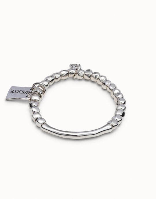 Beaded stretch bracelet with tubular piece and a charm, , large