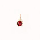 Charm with a red crystal