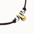 Collar de cuero con tres esferas ba&ntilde;adas en mix de plata y oro 18k