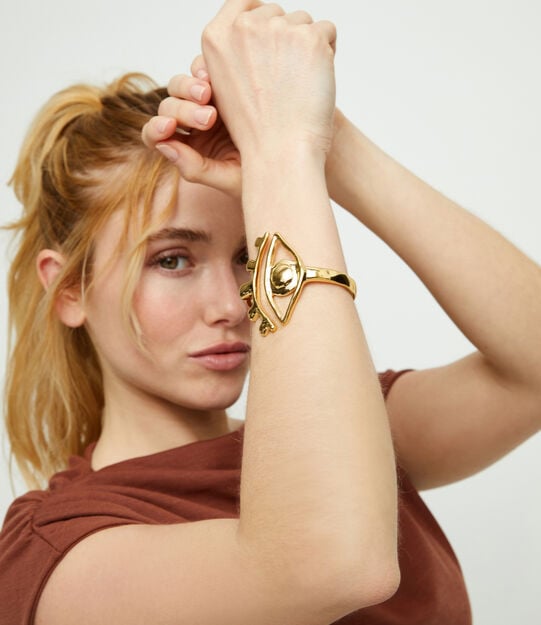 Gold rigid bracelet with eye
