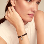 Leather bracelet with a heart charm