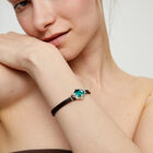 Leather bracelet with green oval faceted crystal
