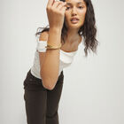 Bangle bracelet with intertwined organic shapes
