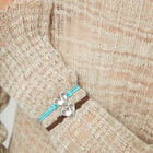 Turquoise elastic thread bracelet with heart charm