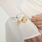 Bangle bracelet with two irregular drops