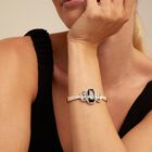 Bangle bracelet with hidden spring and crystals