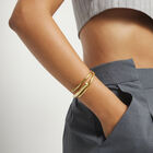 Bangle bracelet with three intertwined organic shapes