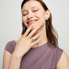 Eye-shaped ring with faceted blue crystal