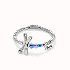 Beaded stretch bracelet with a dragonfly and blue crystal