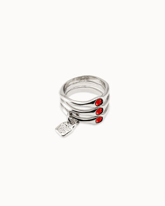 Sterling silver-plated triple ring with red crystals.