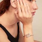 Bangle bracelet with inner spring