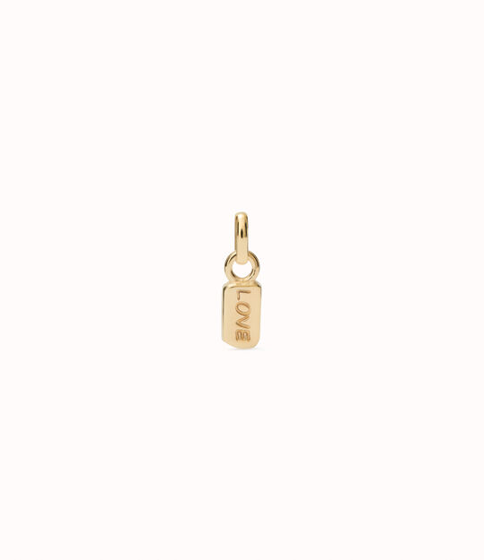18K gold-plated charm with the word “love”.