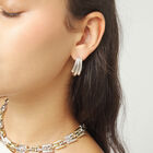 Stud earrings with elongated organic shapes