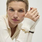 Bangle bracelet with rounded shapes