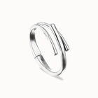 Bangle bracelet with three intertwined organic shapes