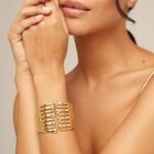 Bangle bracelet with multiple nail heads
